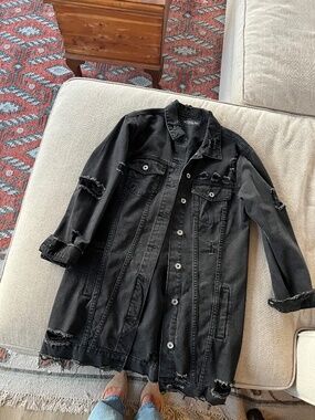 Long distressed black jean jacket from The Darling, size M